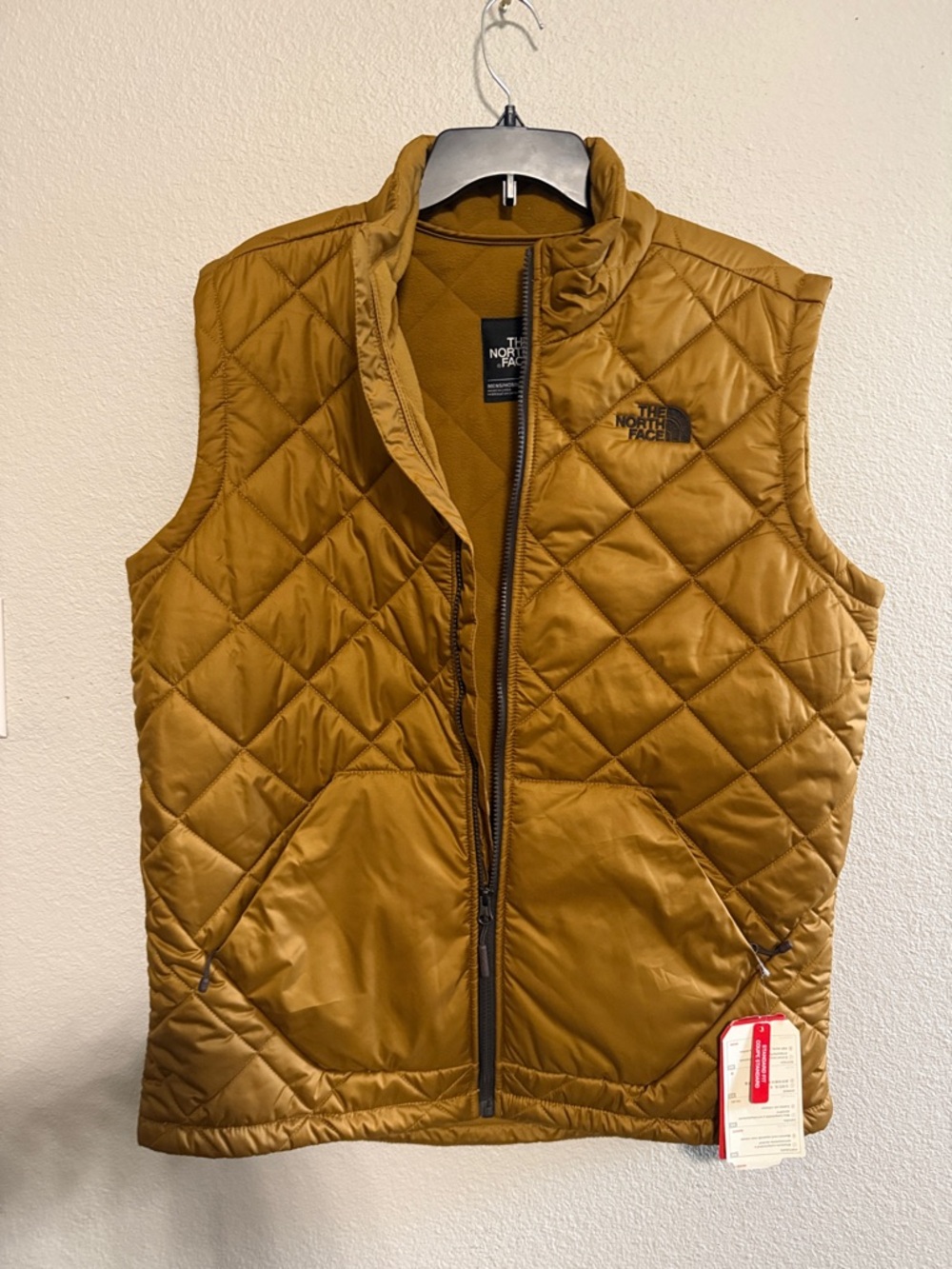 The North Face Quilted Vest in Mustard